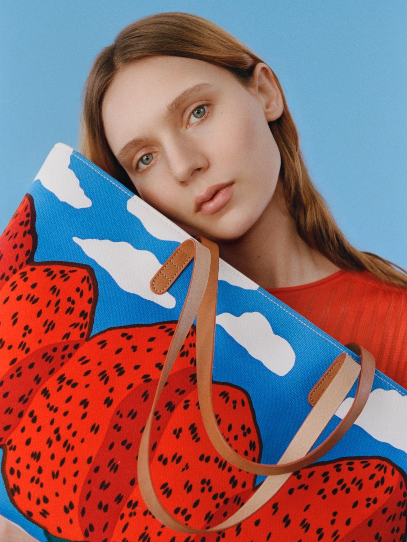 Girl with Mansur Gavriel x Marimekko bag